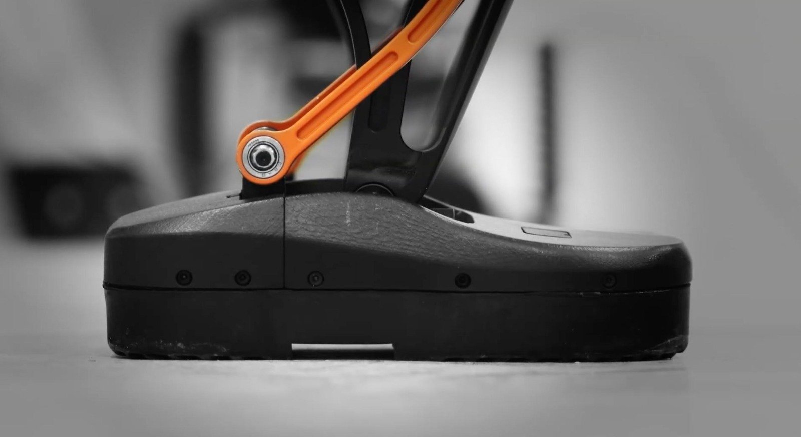 Close-up of Roger’s foot and orange ankle linkage